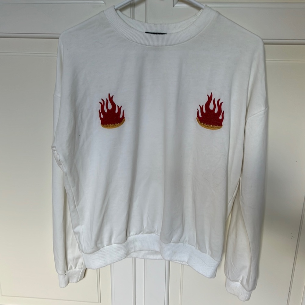 La flame embroidered sweater